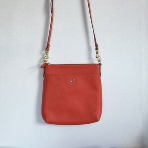 Coach Orange Pebble Leather Crossbody Bag With Front Pocket
